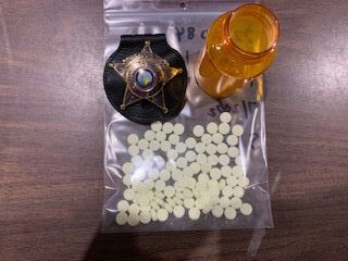 CCSO narcotics agents seized 100 oxycodone tablets in the arrest of an 81-year-old suspect. (CCSO photo)