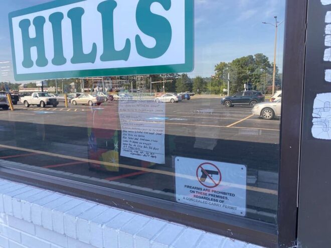 Contributed photo of a "no firearms" sign at an area Hills.