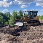 Tractor plow on forest fire