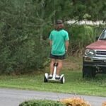 A salesman on a hoverboard