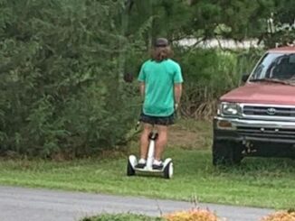 A salesman on a hoverboard