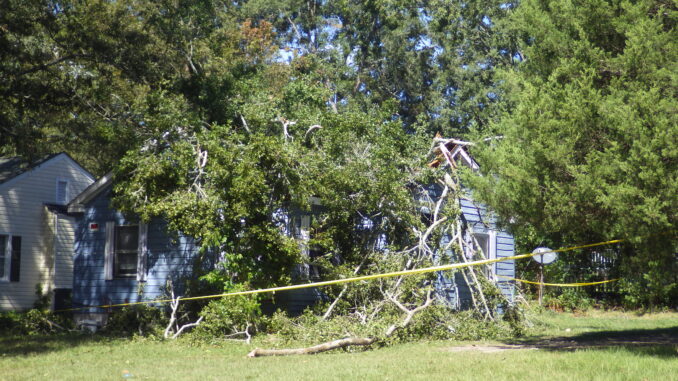 This home on Lee Street in Whiteville was demolished and five people trapped inside after Ian's winds pushed a hundred-year-old pecan tree over.