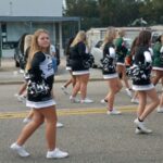 Cheerleaders wearing white shoes