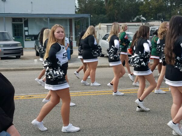 Cheerleaders wearing white shoes