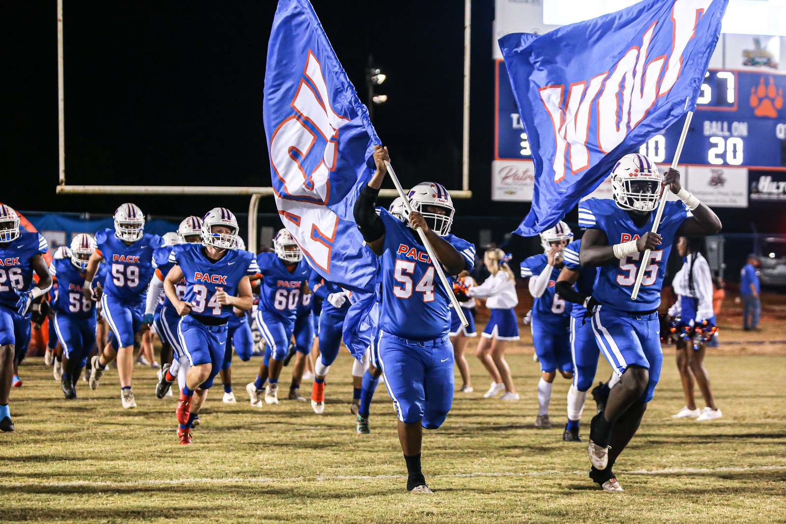 Football players with a flag
