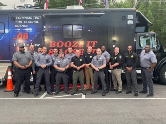 Sheriff Bill Rogers with some of the personnel involved in the enforcement campaign.