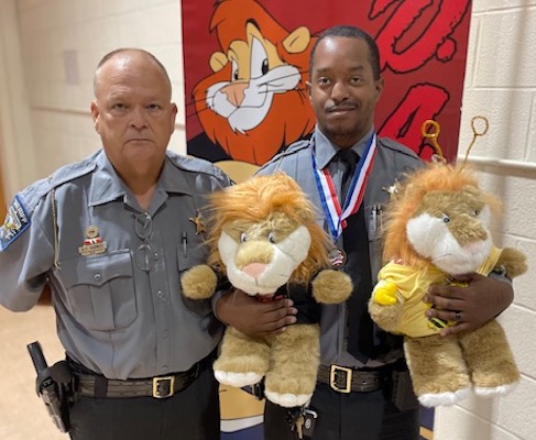 DARE Deputy Dwayne Barnes, Deputy Ricky Lewis and Daren, the DARE mascot presented to all graduates. (CCSO photo)