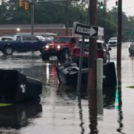 Madison Street was blocked downtown Wednesday when high water led to stalled cars and debris.