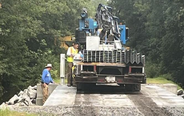 The wooden bridge on Roberts Road through the Green Swamp is being replaced with a more modern bridge with guardrails.