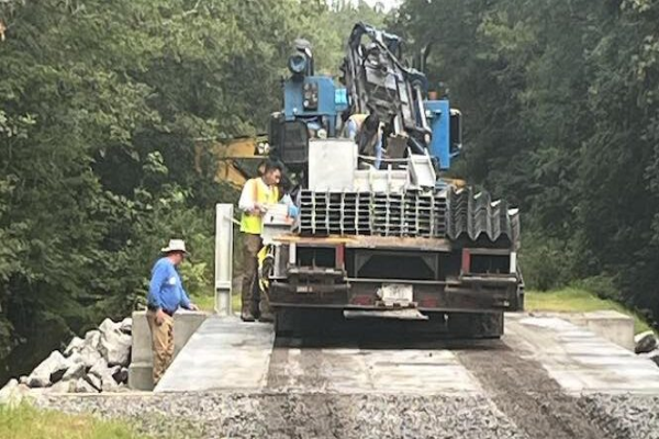 The wooden bridge on Roberts Road through the Green Swamp is being replaced with a more modern bridge with guardrails.