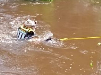 ADR Swiftwater Technician Adam Coleman makes his way to the submerged truck (ADR Photo)
