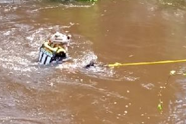 ADR Swiftwater Technician Adam Coleman makes his way to the submerged truck (ADR Photo)