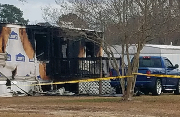 Investigators are trying to determine why this trailer near Hallsboro burned early Friday.