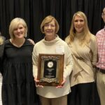 Ann Ferguson (center) and family