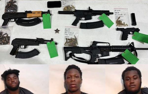 Davon long, JaQuavious Bellamy, and Rajon Reaves with the weapons seized by arresting deputies. (CCSO photos)