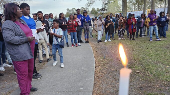 A candlelight vigil for Antonio Maultsby Jr.