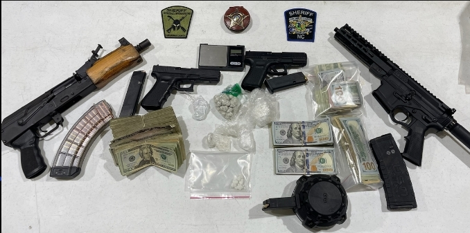 Narcotics and cash seized during Thursday's raids. (CCSO photo)