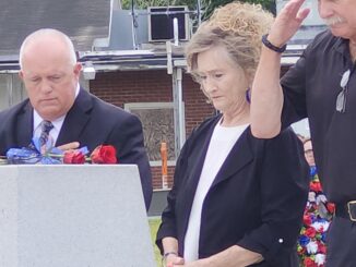 TCPD Officer Timothy "Shane" Miller's parents at Friday's service.