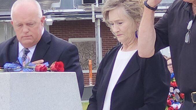 TCPD Officer Timothy "Shane" Miller's parents at Friday's service.