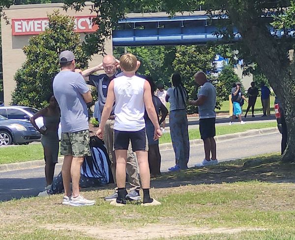 Friends, family and school personnel gathered outside the Columbus Regional Emergency Department waiting for news of the wreck victims.