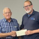 Robert Mills and Marc Murphy with the Southern Farm Days donations to the Boys and Girls Home. (Submitted)