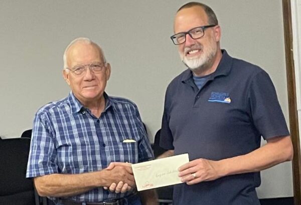 Robert Mills and Marc Murphy with the Southern Farm Days donations to the Boys and Girls Home. (Submitted)