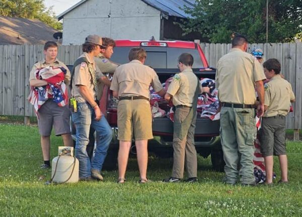 Members of two local scout troops helped with Friday's flag retirement ceremony. (Angela Norris photo)
