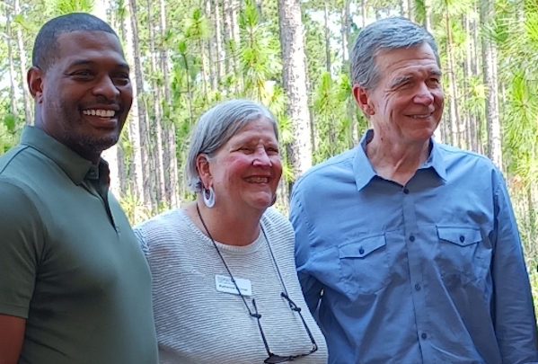 EPA Administrator Michael Regan, Nature Conservancy Executive Director Katherine Skinner, and Gov. Roy Cooper Tuesday at the Green Swamp announcement. (Photos and video by Darrell Jackson)