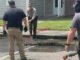 A wayward alligator was evicted from the Hampton Court apartments in Whiteville today (Monday). The gator was thought to have been pushed out of the swamp due to Hurricane Debby's floodwaters. (WPD Photo)