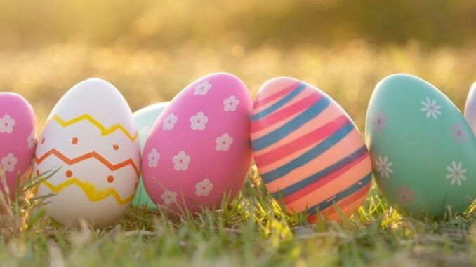 decorated easter eggs in a row