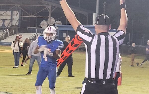 Corey Fsison after his touchdown run Friday.