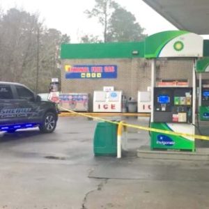 Crime scene tape surrounded the gas pumps and front door of the Sam's Pit Stop Saturday after a man was stabbed.