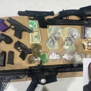 Deputies seize guns, drugs and cash during the raid on Thurman Jenrette's home. (CCSO photo)