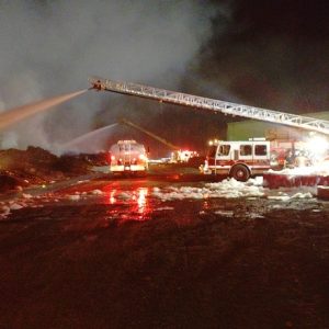 Fire crews worked through the night to control Saturday's fire at the West Frazier sawmill. (ADR photo)
