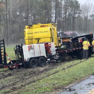 The two trucks collided while skidding on wet roads to avoid trees falling in this afternoon's storm. (Jeff Reichert)