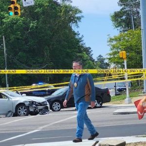 Investigators on the scene of a shooting and wreck that blocked Washington and Powell in Whiteville Sunday morning.