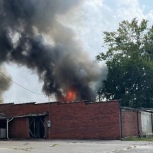 Firefighters from multiple departments are in Fair Bluff, trying to stop a structure fire from spreading to more buildings downtown.