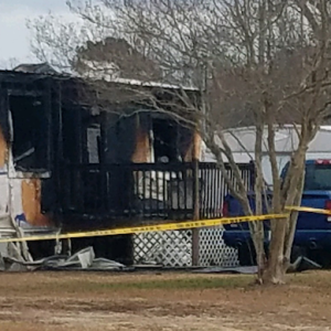 Investigators are trying to determine why this trailer near Hallsboro burned early Friday.