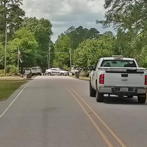 Lake Waccamaw Police and Park Rangers have taken a man into custody after witnesses said he stole a firearm, then hid in a camper on Bella Coola. (Submitted photo)
