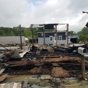 Nothing remains of the warehouse on Magnolia Street after an early morning fire Monday.
