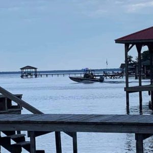 A search boat heads out to join the effort to find the missing man.