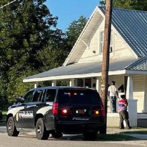 Deputies arrested at least one man -- who refused to give his name to authorities -- in the raid on this home (Kandi Thompson photo)