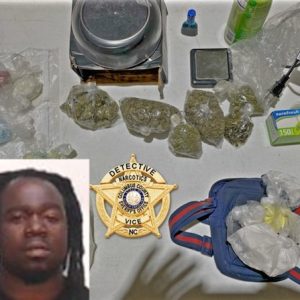 Curtis Moore was arrested carrying $60,000 in illegal narcotics.