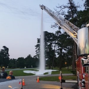 Firefighters watch as a new foam delivery system is tested at a recent ADR training session. (ADR Photo)