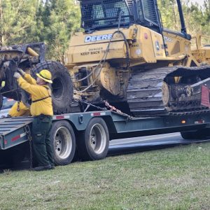 Small fires can quickly get out of control, requiring the use of heavy equipment such as this tractor plow. (NCFS photo)