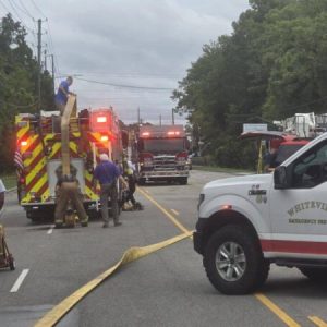 Madison Street at the Soules Swamp Bridge was blocked while firefighters dealt with the second fire in 24 hours at Southern Tire. (Glasgow Hicks photo)