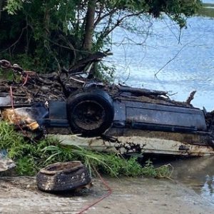 The burned-remains of this 1980s Ford Mustang were finally recovered after ten hours of work Monday. (CCSO photo)