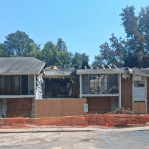 Seven apartments were destroyed and one heavily damaged after a discarded cigarette ignited decorative pine straw in Whiteville last week. (Contributed photo)