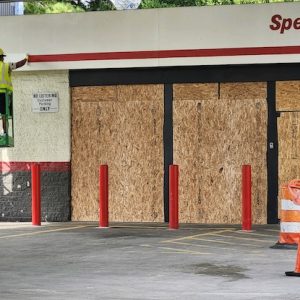 Crews boarded up and painted over the Speedway store this week. The business closed due to rising crime in the area, according to former employees.